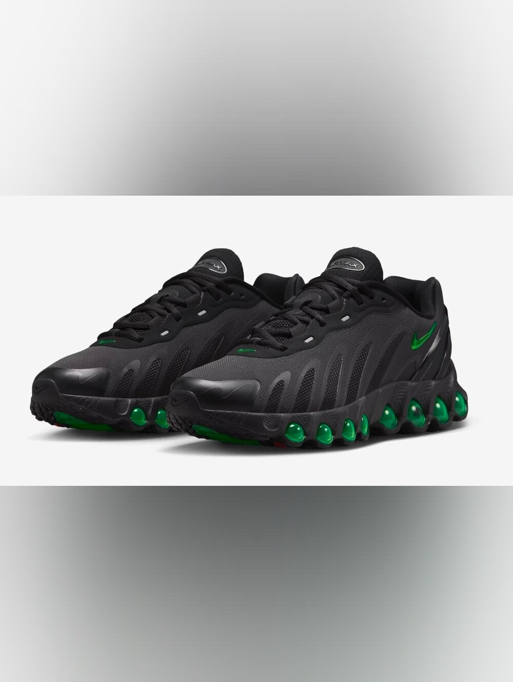 Nike Men’s Black Running Shoes with Green Accents